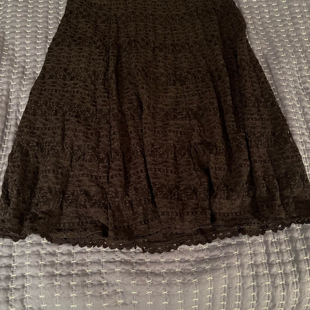 Oscar de la Renta black lace skirt with elastic waist.